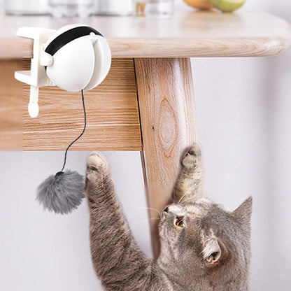 A close-up shot of the Lifting Ball Cat Toy in action, capturing your cat's attention with its exciting electric flutter. Watch as your feline friend pounces and plays with this interactive toy for hours of fun.