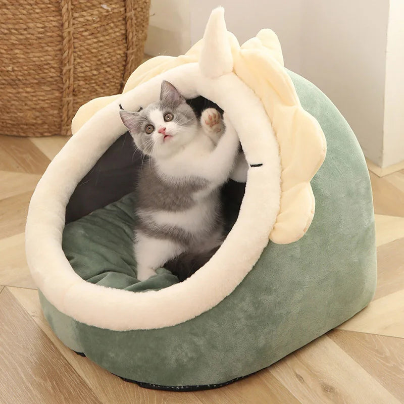 Cat lounging in cozy Pet Tent Cave Bed for cats and small dogs. Soft cotton, detachable cushion for hygiene. Adorable design adds charm to any room.