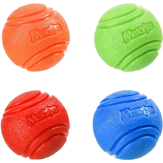Vibrant close-up of our assortment of pet dog balls - a chew-resistant, bouncy rubber collection for all-weather outdoor play. These waterproof dog toys are designed to promote interactive exercise, ensuring long-lasting enjoyment and safe fun for your furry friend.